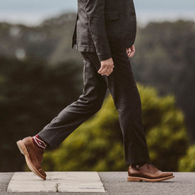 The fit model wearing the telegraph suit and walking through San Francisco