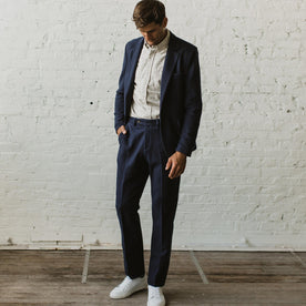 Our fit model wearing The Telegraph Trouser in Navy Boiled Wool by Taylor Stitch.