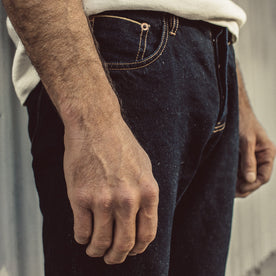 Our fit model wearing The Slim Jean in Sol Selvage Denim.