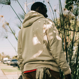 fit model showing back of The Fillmore Hoodie in Sunflower Embroidery
