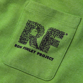 material shot of printed chest pocket of The Heavy Bag Tee in Chlorophyll