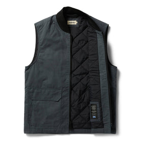 open flatlay of The Anchorage Vest in Charcoal Dry Wax