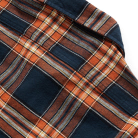 material shot of The Ledge Shirt in Rust Plaid's back yoke