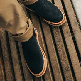 our fit model wearing The Ranch Low in Weatherproof Navy Suede—cropped shot looking down
