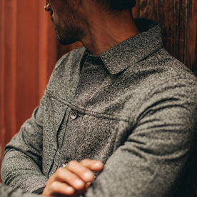 fit model wearing flatlay of The Dispatch Jacket in Navy Jaspe, close up of chest