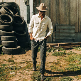 fit model wearing The Point Shirt in Natural Reverse Sateen, hands in pockets