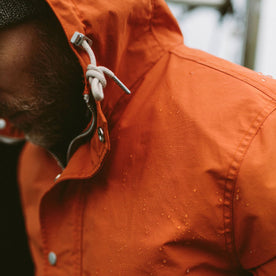 fit model with water droplets on The Dalton Jacket in Rust
