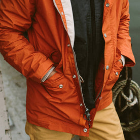 fit model with hands in pocket of The Dalton Jacket in Rust