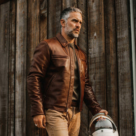 fit model wearing The Moto Jacket in Espresso Steerhide, looking right
