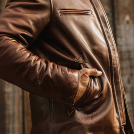 fit model wearing The Moto Jacket in Espresso Steerhide, hand in pocket