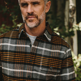 fit model wearing The Moto Shirt in Orange Plaid, up close of chest