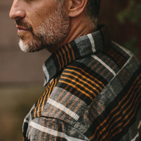 fit model wearing The Moto Shirt in Orange Plaid, shoulder