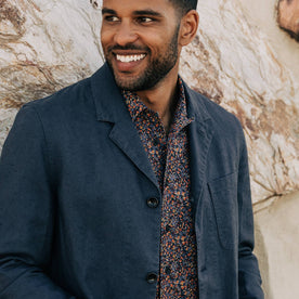 our fit model wearing The Gibson Jacket in Navy—smiling
