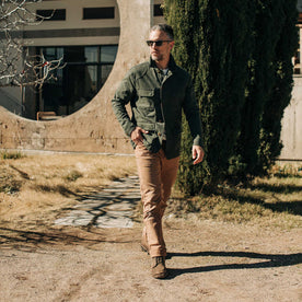 out fit model wearing The Project Jacket in Olive Boss Duck