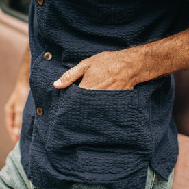 our fit model wearing The Caravan Shirt in Navy Seersucker—hand in pocket