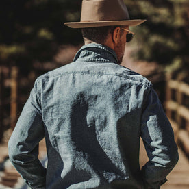 our fit model wearing The Moto Utility Shirt in Indigo Pindot
