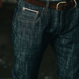 our fit model wearing The Democratic Jean in Green Cast Selvage