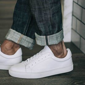 our fit model wearing the slim jean in Green Cast Selvage