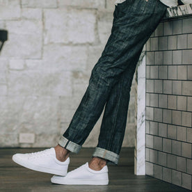 our fit model wearing the slim jean in Green Cast Selvage
