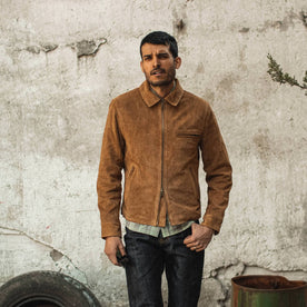 fit model wearing The Wyatt Jacket in Cognac Suede, hand in pocket