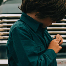our fit model wearing The Little Yosemite Shirt in Deep Ocean—side material shot of sleeve