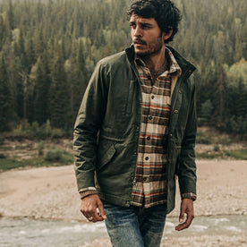 our fit model wearing The Harris Jacket in Forest Dry Wax—looking left