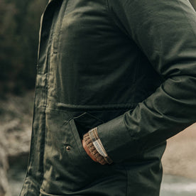 our fit model wearing The Harris Jacket in Forest Dry Wax—hands in pockets