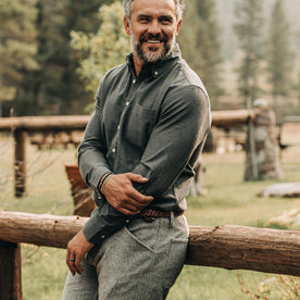 our fit model wearing The Jack in Charcoal Crepe—smiling, looking right