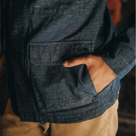 fit model wearing The BDU Shirt Jacket in Indigo Slub, hand in pocket up close