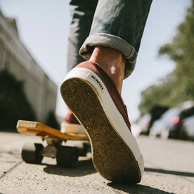 fit model wearing The Sano Slip-On in Rust Boss Duck, skating
