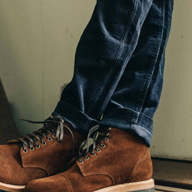 our fit model wearing The Camp Pant in Indigo Corduroy—cropped shot of pant bottom