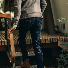 our fit model wearing The Camp Pant in Indigo Corduroy—walking up stairs