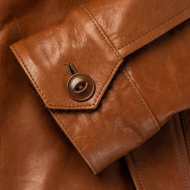 material shot of button on wrist