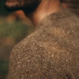 our fit model wearing The Hardtack Sweater in Oak Donegal—cloes up of left shoulder seam