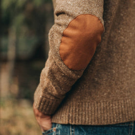 our fit model wearing The Hardtack Sweater in Oak Donegal—closeup of left elbow leather patch