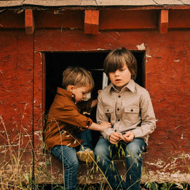 our fit model wearing The Little Yosemite Shirt in Oat Donegal—hanging out with his brother