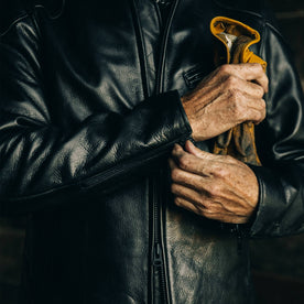 our fit model wearing The Band Collar Moto Jacket—cropped shot of chest