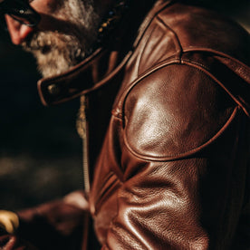 our fit model wearing The Band Collar Moto Jacket—shoulder shot