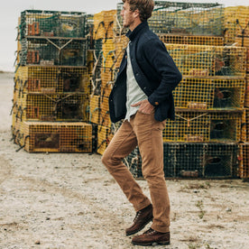 fit model wearing The Ojai Jacket in Indigo Diamond Plate, walking left